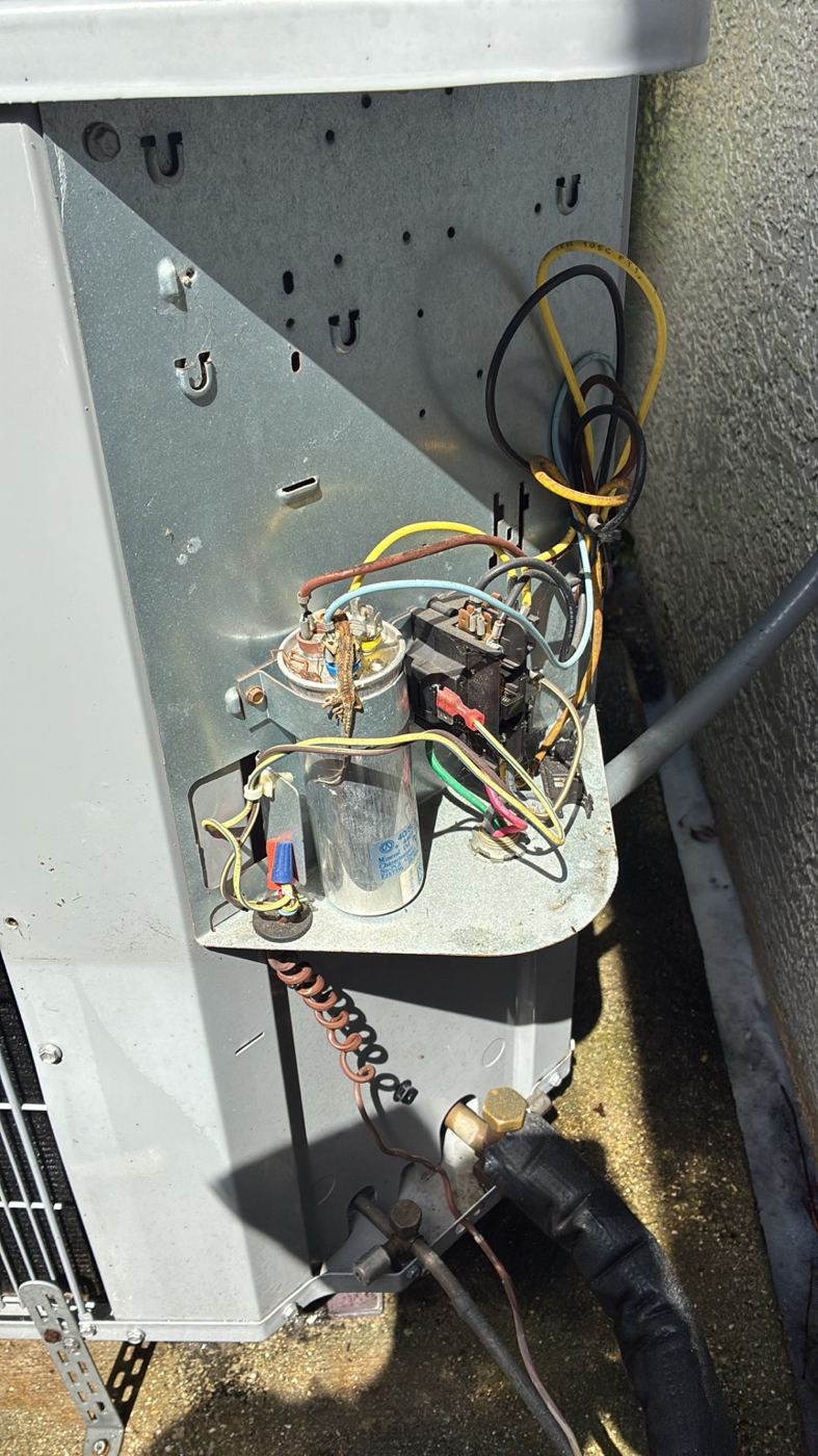 Naples AC outdoor unit electrical compartment