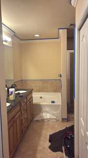 Warm neutral bathroom painting project in Naples