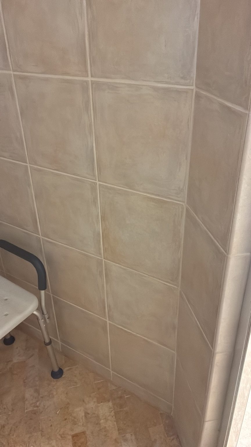 Tiled shower wall before grab bar installation